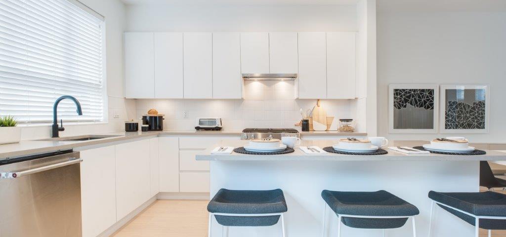 The homes at Berkeley Village include open-concept spaces, nine-foot ceilings on the main floors, oversized windows and durable laminate wood floors throughout main levels.